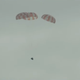 The first view of Orion during its parachute-assisted descent.